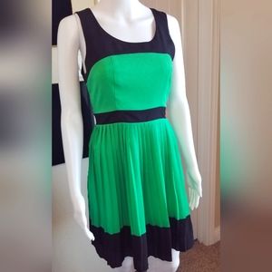 Monteau black and green pleated tank dress with bow tie back.